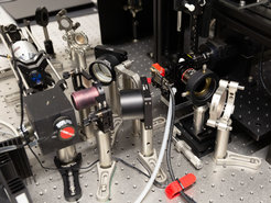 Sample chamber with illumination and detection optics.