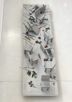 A flower ceremony was held during the inauguration of Never Forget on May 24, 2022. Forty employees of the MPI for Brain Research read out the names and laid down a unique flower to commemorate each of the forty children, killed on October 28, 1940 in the name of science.